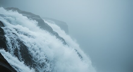 Powerful waves crashing over rocks