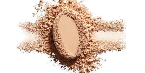 Light beige powder scattered around a central compressed powder compact