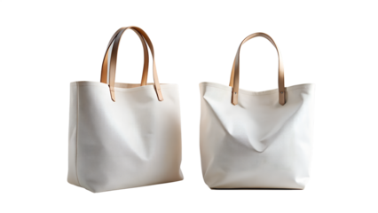 Two white tote bags with leather handles isolated on transparent background