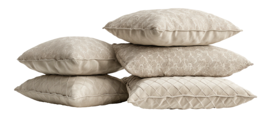 Stack of light beige decorative pillows