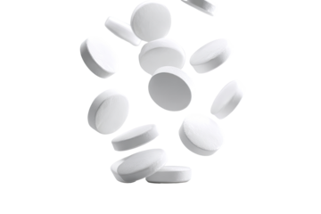 White pills in mid-air, various angles