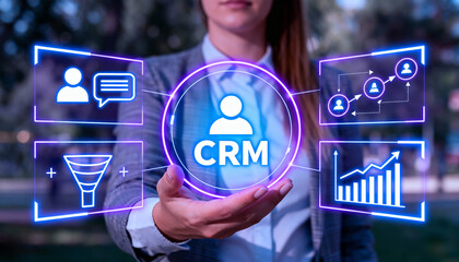Business woman presenting customer relationship management CRM digital interface with social network icons, sales funnel, data analysis and user connections for marketing and growth strategy