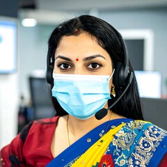 Woman wearing a headset and mask