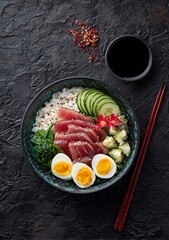 Vibrant sashimi tuna with fresh rice, colorful vegetables, and perfectly cooked eggs, a healthy and delicious meal presentation ideal for culinary blogs and restaurant promotions.