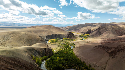 Unreal, ethereal landscapes of lakes and rivers on a sunny autumn day in the Altai foothills, captured by a drone