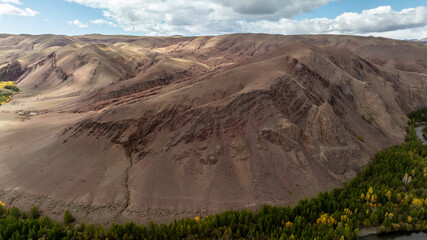 Unreal, ethereal landscapes of lakes and rivers on a sunny autumn day in the Altai foothills, captured by a drone
