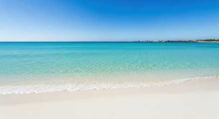 Fototapeta premium Vibrant tropical beach scene with crystal clear turquoise water and white sand shoreline