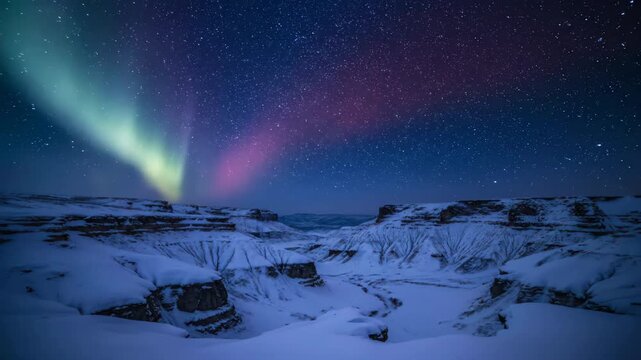 A moody time-lapse reveals the slow ebb and flow of a deep blue and crimson aurora over ancient, snow-dusted rock formations slow ebb and flow, wilderness, ice