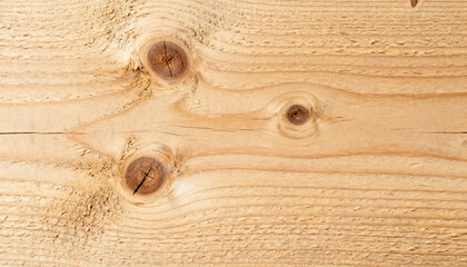 Textured knotted pine wood surface. Pale raw timber with grain. Natural wooden background for carpentry. Rustic lumber plank texture with knots. Abstract material pattern.