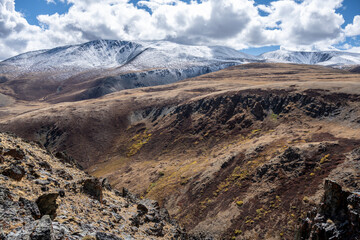 A beautiful autumn landscape with mountains and gorges in Altai, captured with a drone.