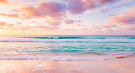 Obraz premium Serene beach scene with pastel sunset clouds and gentle waves calming ocean view