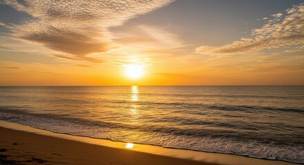 Serene beach sunrise golden hour ocean waves reflecting sunlit sky and clouds calm tropical horizon