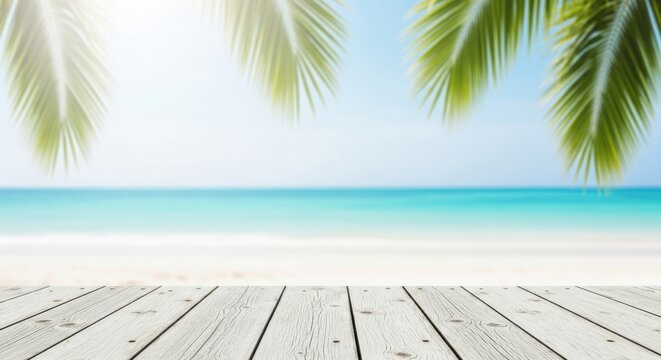 Serene tropical beach scene with palm leaves and wooden deck looking towards the ocean