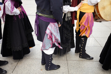Galician musician holding a tambourine