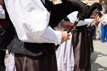 Galician musician playing a bagpipe