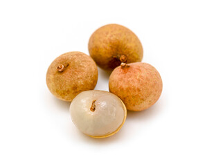 Fresh peeled and unpeeled Longan or Dimocarpus longan isolated on white