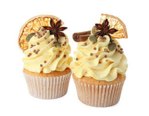 Delicious cupcakes with sprinkles and spices isolated on white. Autumn atmosphere