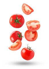 Fresh ripe tomatoes falling against white background