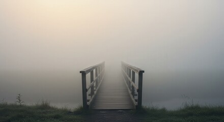 Small bridge in foggy landscape