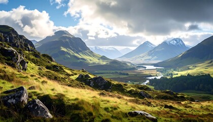 Obraz premium Mountain valley vista under a partly cloudy sky