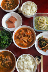 Traditional Korean home meal with kimchi stew and side dishes