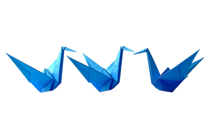 Three origami cranes in a row