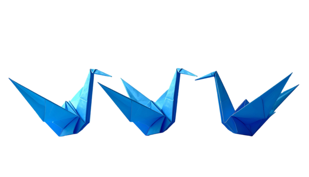 Three origami cranes in a row