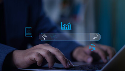 Businessman using a laptop with a virtual interface for an AI-powered search. Concept of data analysis, business intelligence, information research, and modern technology.