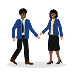 Business professionals greeting each other in a friendly manner during a meeting in a modern office setting