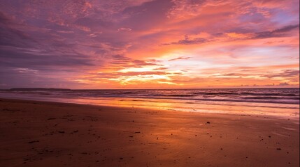 sand. A breathtaking tropical beach sunset with vibrant clouds and golden reflections on the wet sand. inspiring travel planning, travel magazines, designed for outdoor magazines and nature guides.