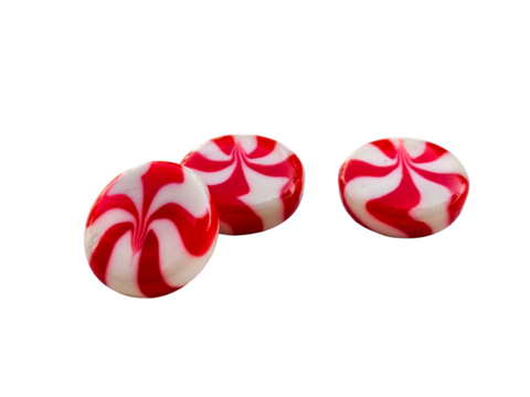 red and white candies on a white surface, cut out