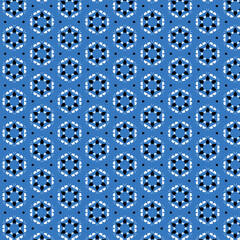 A blue flowery vintage print seamless pattern featuring delicate, hand-drawn blossoms arranged in a soft, continuous rhythm. Muted shades of powder blue, dusty navy, and pale sky tones.