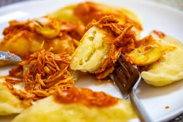 The best, most perfect, and most traditional Ukrainian food, known as perohê or pierog. Typical Christmas food. Mother's food. A fond memory.