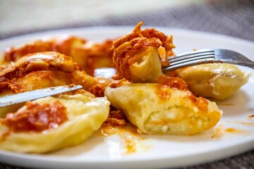 The best, most perfect, and most traditional Ukrainian food, known as perohê or pierog. Typical Christmas food. Mother's food. A fond memory.