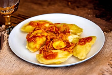 The best, most perfect, and most traditional Ukrainian food, known as perohê or pierog. Typical Christmas food. Mother's food. A fond memory.