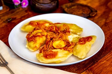The best, most perfect, and most traditional Ukrainian food, known as perohê or pierog. Typical Christmas food. Mother's food. A fond memory.
