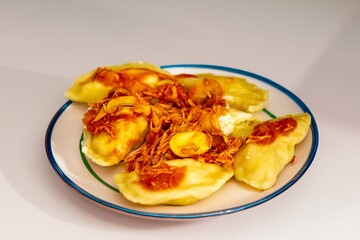 The best, most perfect, and most traditional Ukrainian food, known as perohê or pierog. Typical Christmas food. Mother's food. A fond memory.