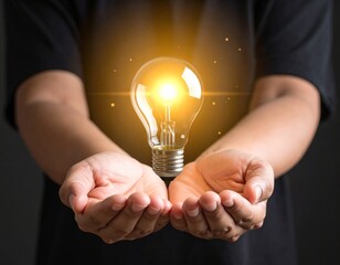 Floating lightbulb above open hands in dark room, symbolizing creativity and innovation.