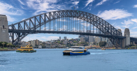 Naklejka premium Ferry on Sydney Harbour with harbour bridge in the background Sydney NSW Australia