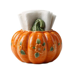 Decorative piece shaped like a pumpkin beside folded napkins isolated on transparent background for Thanksgiving table décor