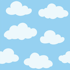 White Clouds Scattered On A Light Blue Sky Background
