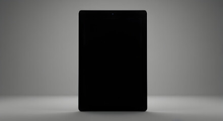 Black tablet computer on grey background --ar 169