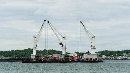 Cargo crane ship in the sea port