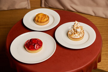 Delicious Desserts A Variety of Assorted Cream Pies Beautifully Presented on Plates