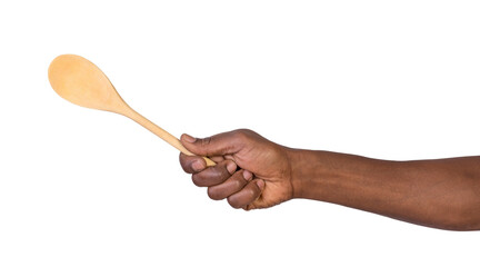 Hand holding a wooden spoon isolated on white or transparent background