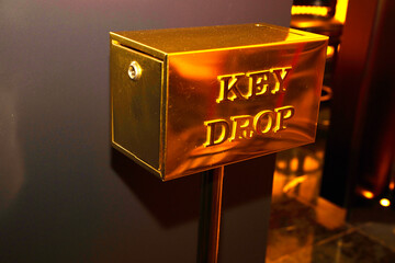 Golden key drop box