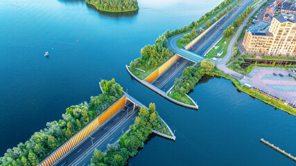 Weluwemeer aqueduct, where water and road traffic pass over or under each other. Netherlands.
