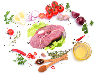 Fres lamb steak spices and vegetables on a white background