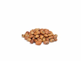 Pile of brown cowpeas isolated on white background 