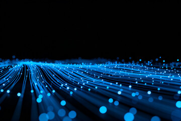 Abstract blue light particles forming a wave-like pattern on a dark background